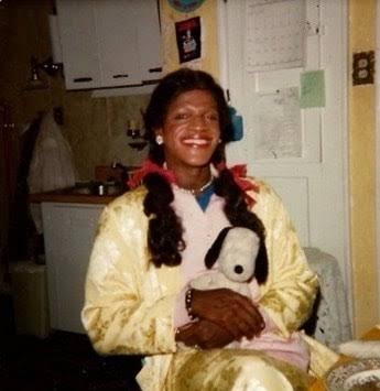 image of Marsha P. Johnson with her snoopy doll