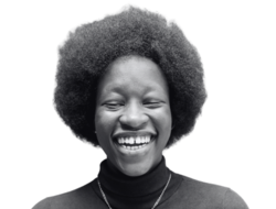 image of a joyful Black person with natural hair and a big, warm smile
