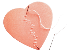 a broken paper heart being sewn back up by needle and thread