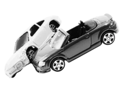 two toy cars in a crash collision