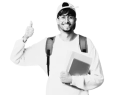 An Indian guy with a backpack and glasses giving a thumbs-up