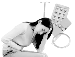 Woman with long black hair sits hunched over, holding her head and stomach as if she is not feeling well. Surrounding her are various forms of hormonal birth control including an IUD, birth control pills, the morning after pill, a Depo-Provera shot, and a birth control ring.