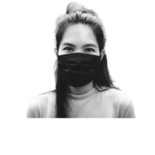 a young Asian person masking to protect themselves and others from COVID