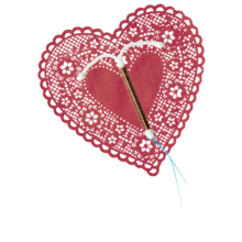 a paper lace valentine heart with an IUD on top of it